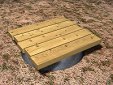 Couvercle en bois placé sur chantier pour couvrir totalement le vide horizontal d'excavation d'un pieu